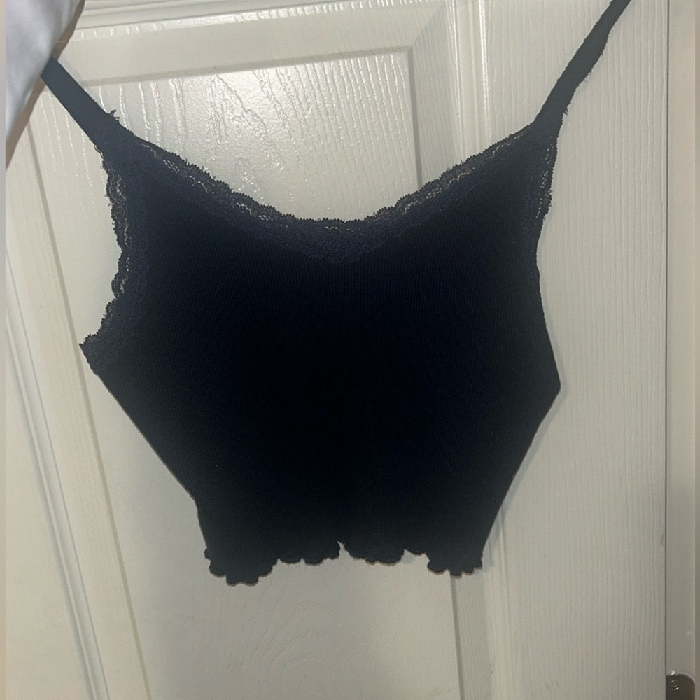Brandy  Melville  navy blue tank with tags never worn( I bought 2 on accident)